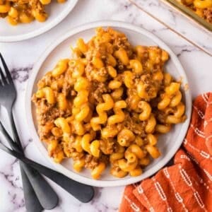 cheeseburger casserole recipe on a round grey plate.