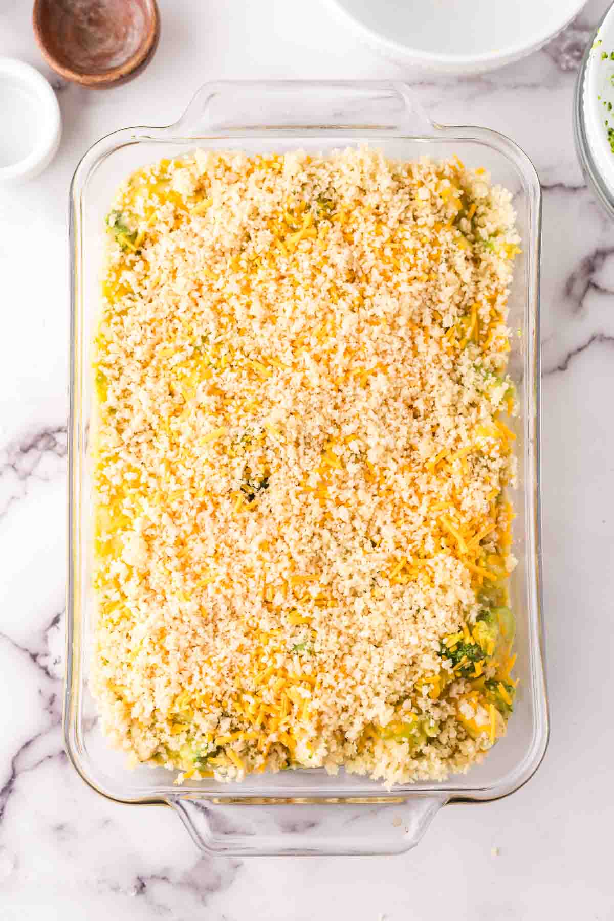 casserole dish with unbaked ingredients for the chicken divan recipe.