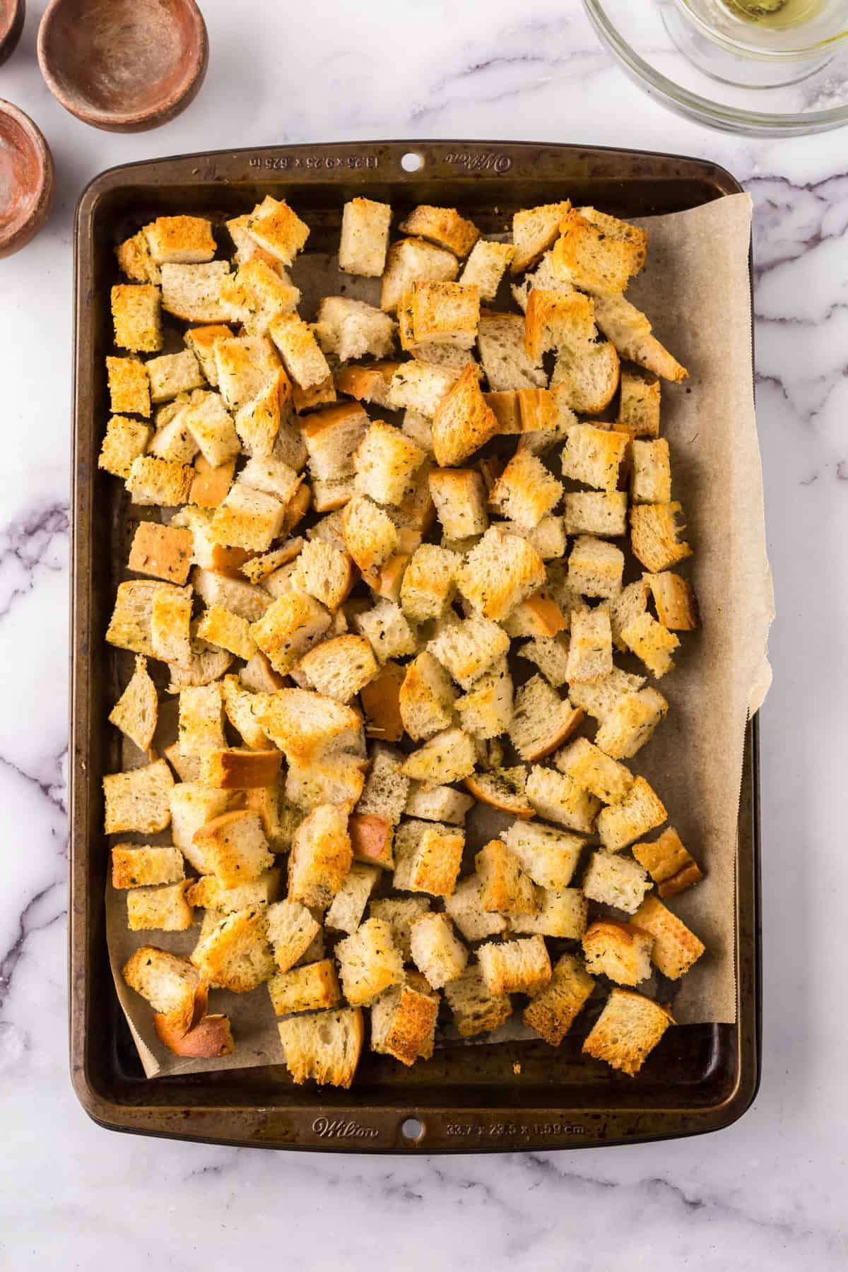 bakings sheet fresh from the oven with homemade crouton recipe.