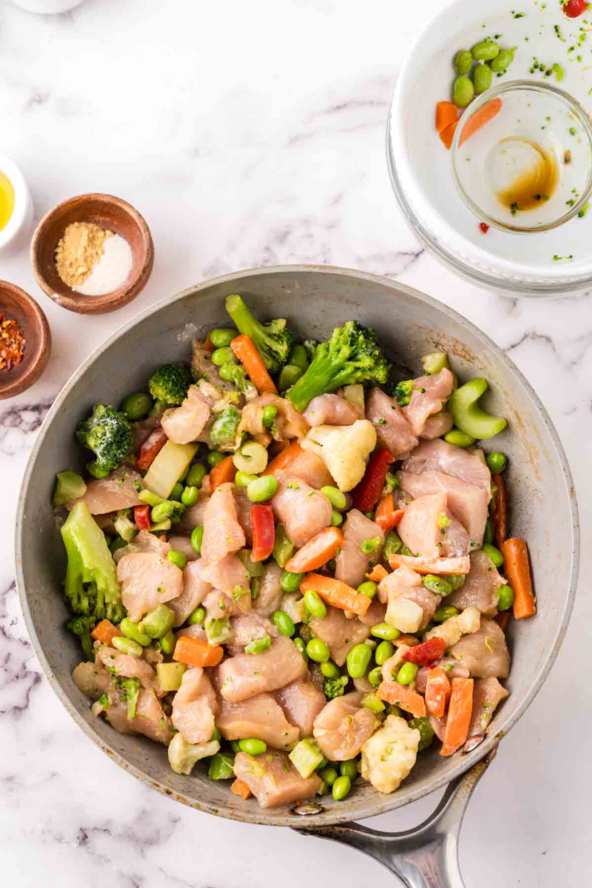 sauce pan in the process of making kung pow chicken.