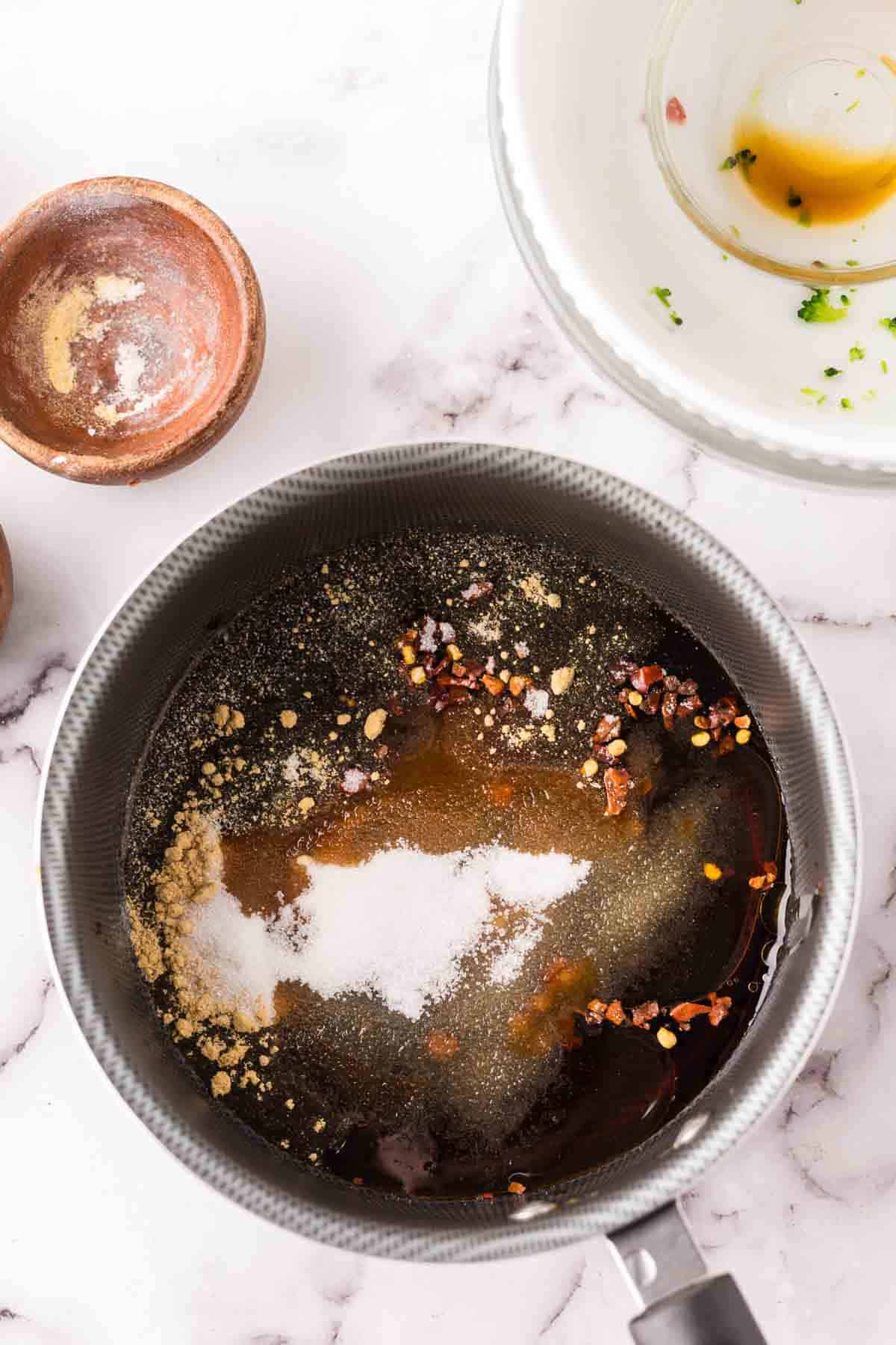 sauce pan in the process of making kung pow chicken.