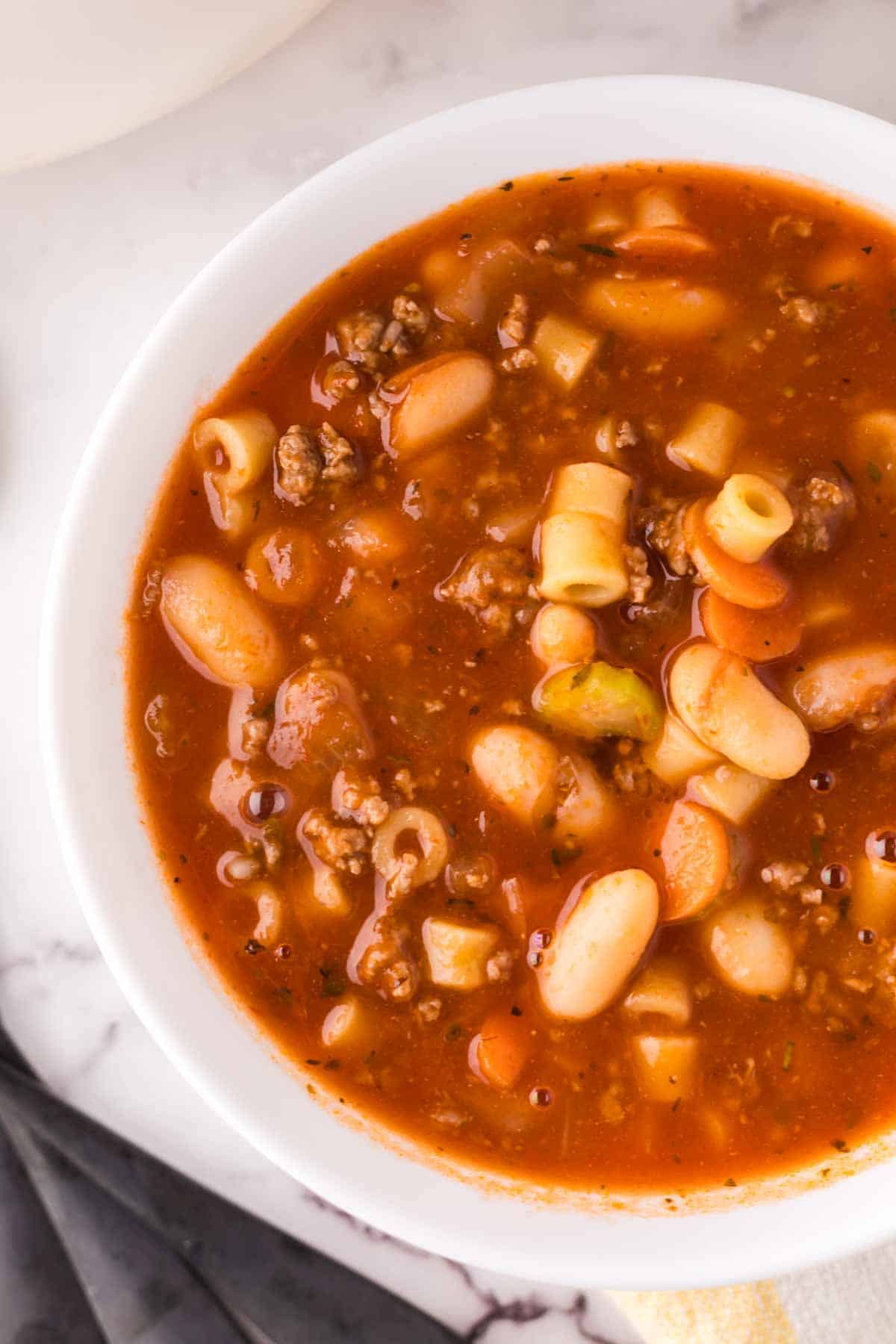 small white bowl with pasta fagioli soup recipe.