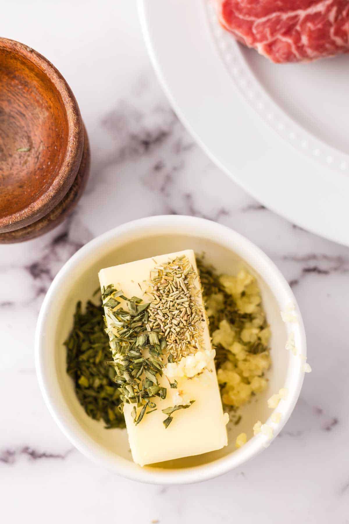 compound butter ingredients in a small white dish.