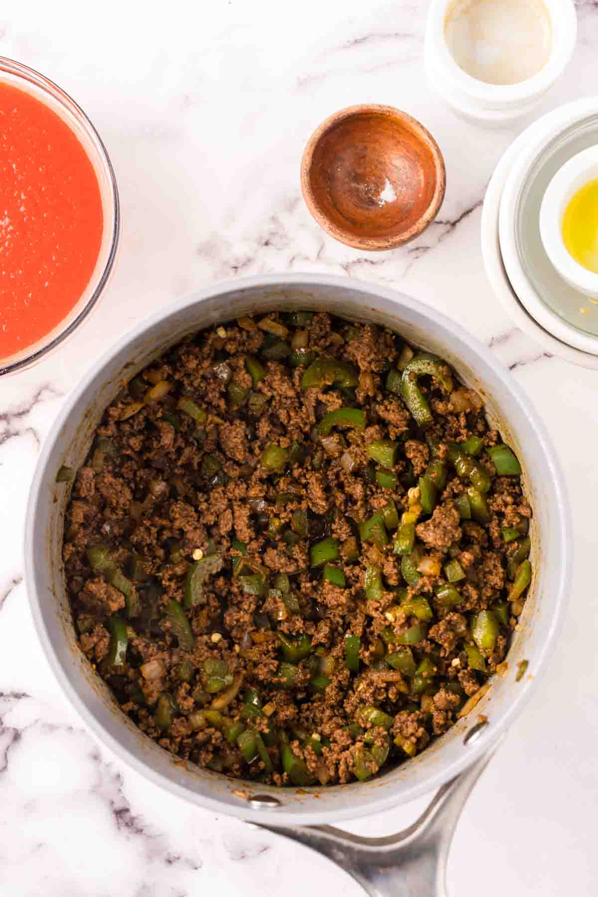 soup pan with the process of making Texas chili.