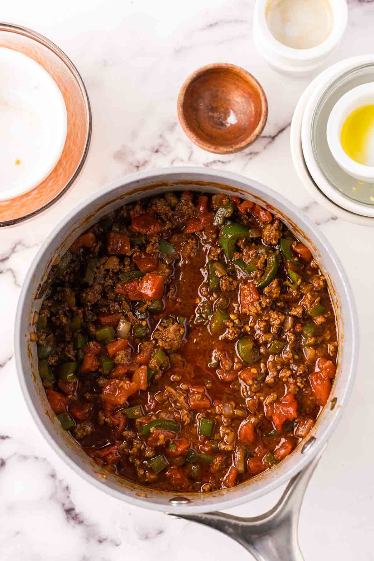 soup pan with the process of making Texas chili.