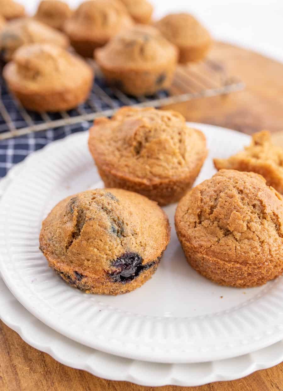 overnight sourdough muffins on a white plate.