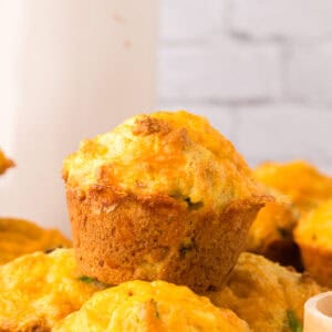 baked cheddar bacon cornbread muffins on the counter.