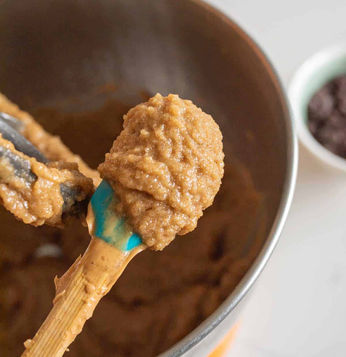 chocolate chip cookies with peanut butter chips dough in the mixing bowl.