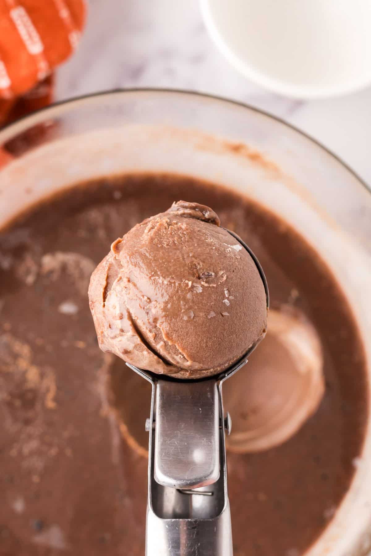 mixing bowl in the process of making chocolate truffle ice cream.