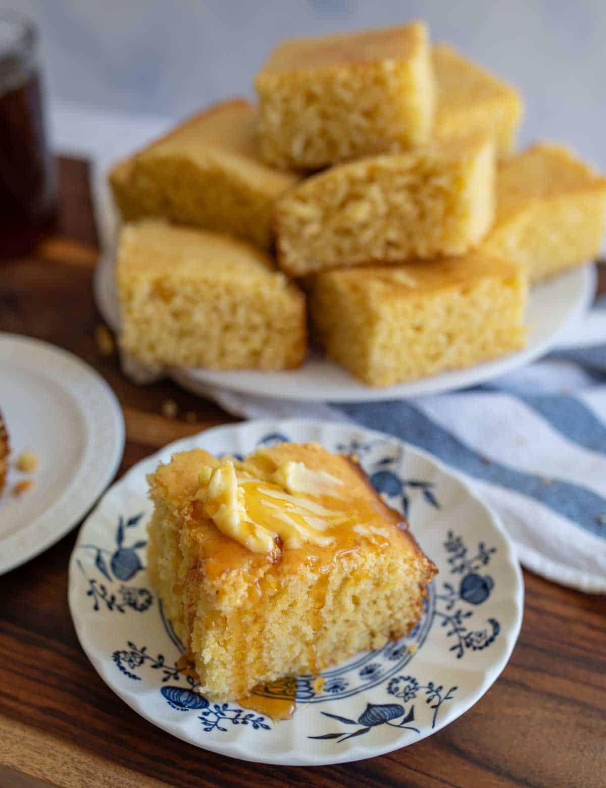 slice of cornbread with honey and butter