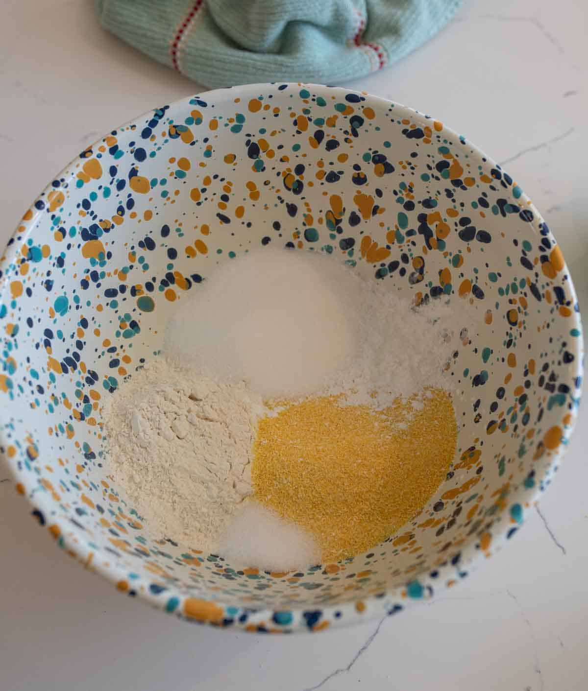 dry ingredients for cornbread in bowl.