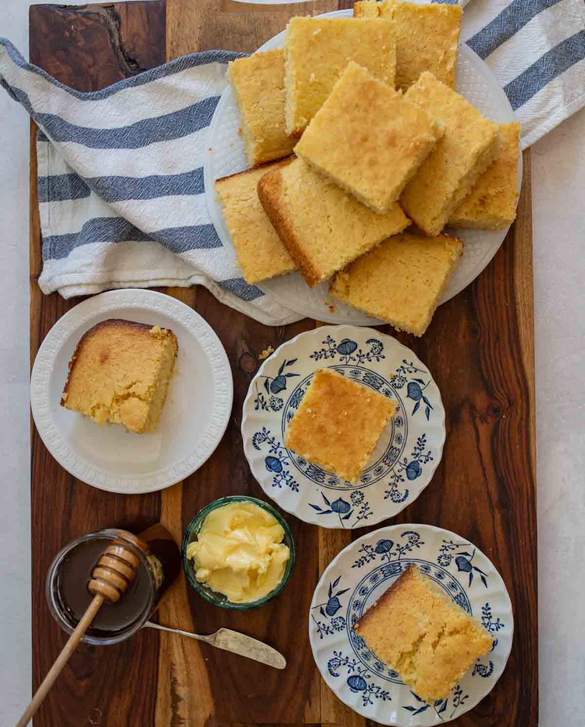 stack of cornbread with butter and honey