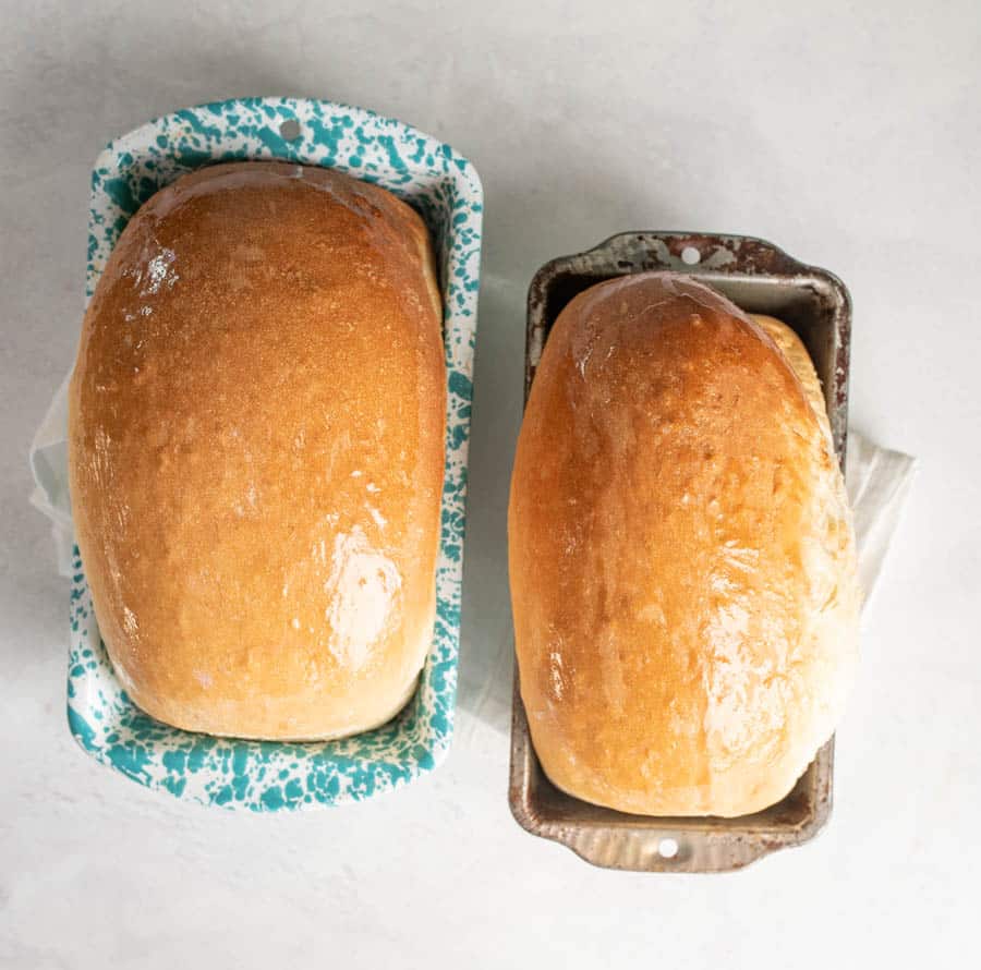 fluffy white sandwich bread in the tin.