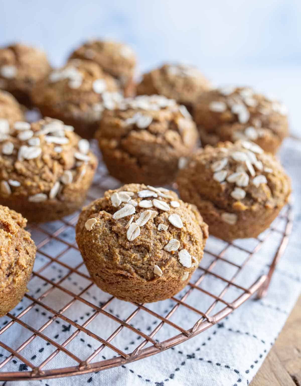 healthy pumpkin muffins baked and on the cooling rack.