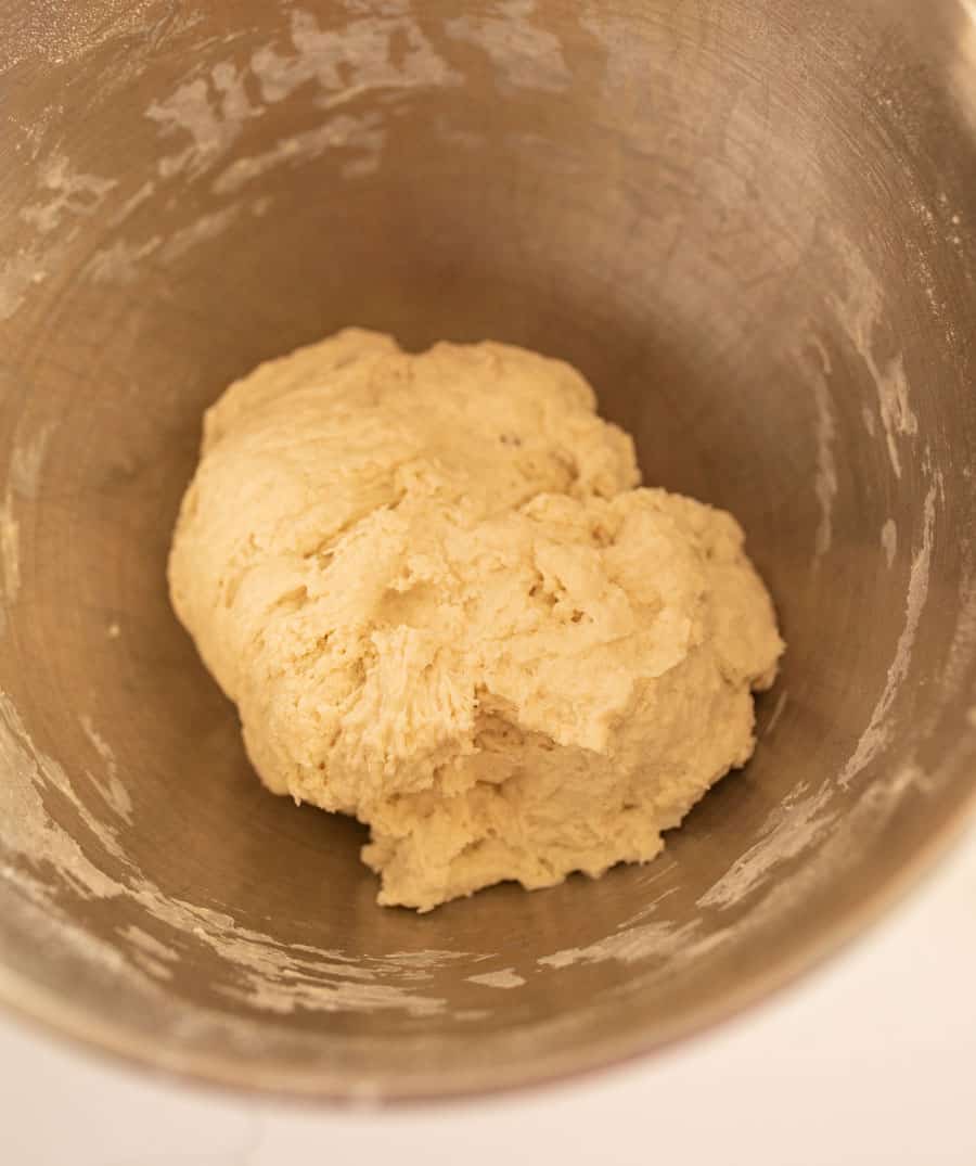The Italian bread dough after mixing and kneading with a stand mixer. 