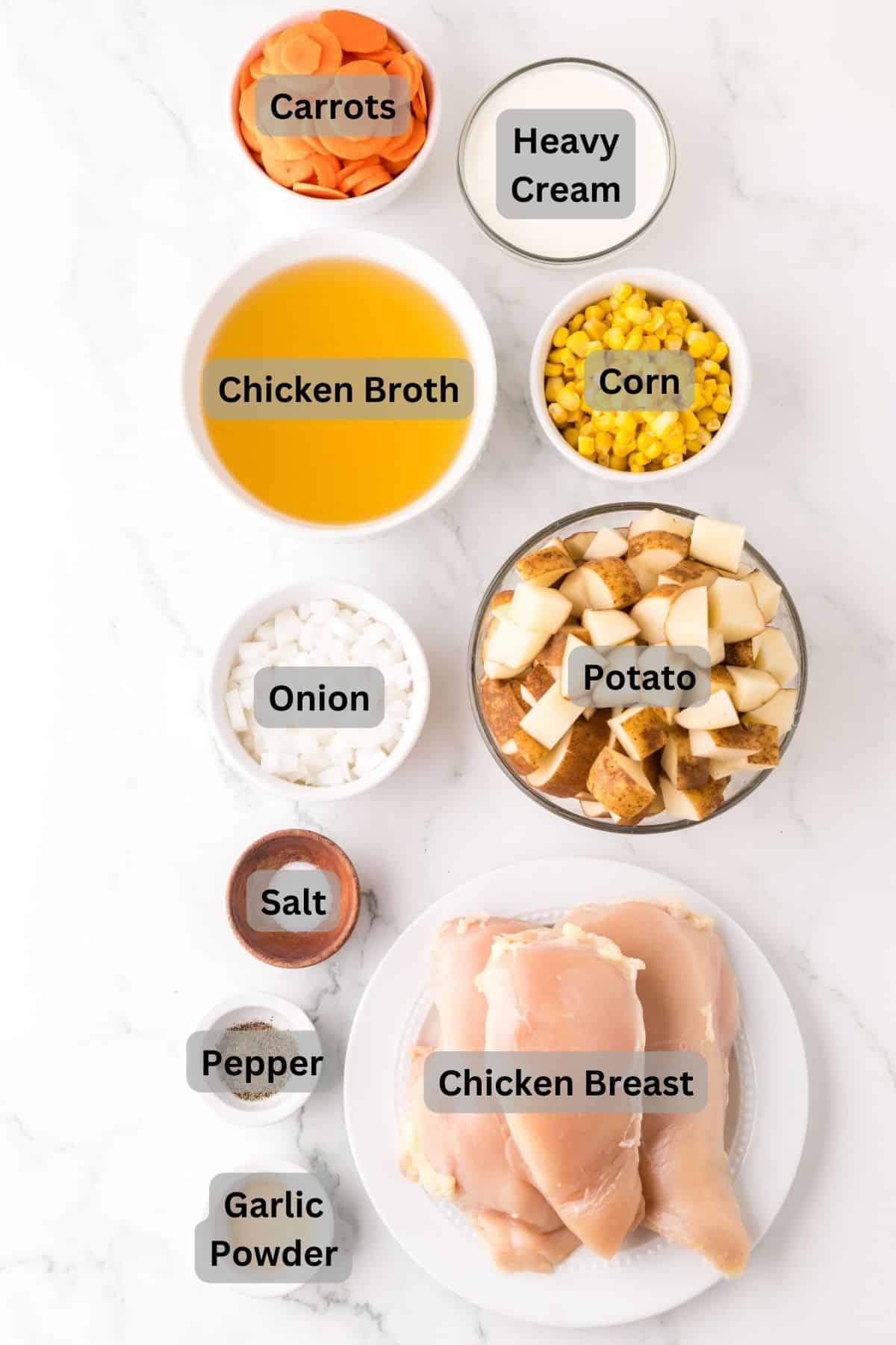 portion bowls each with digitally labeled raw ingredients to make Baked Potato Corn Chowder.