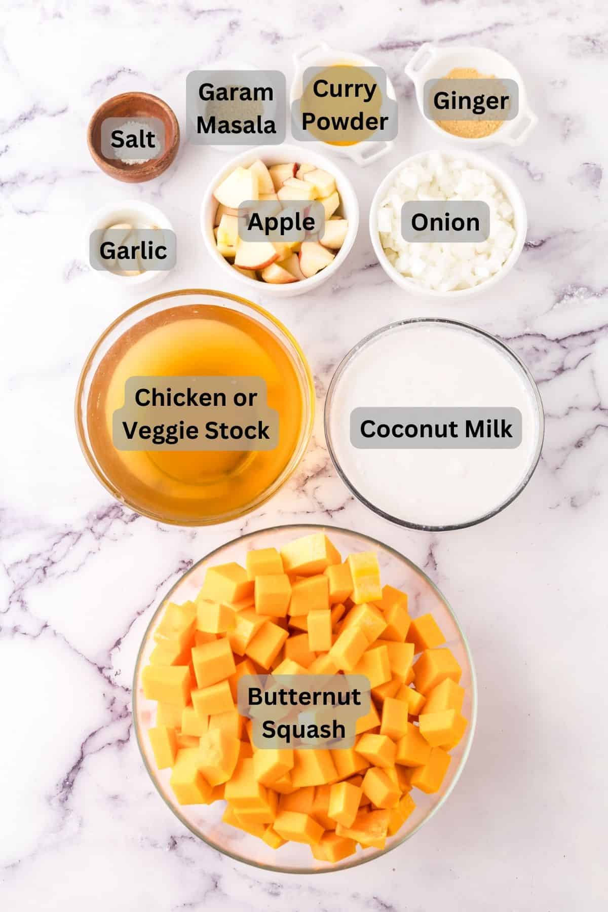 portion bowls each with digitally labeled raw ingredients to make homemade butternut squash soup.