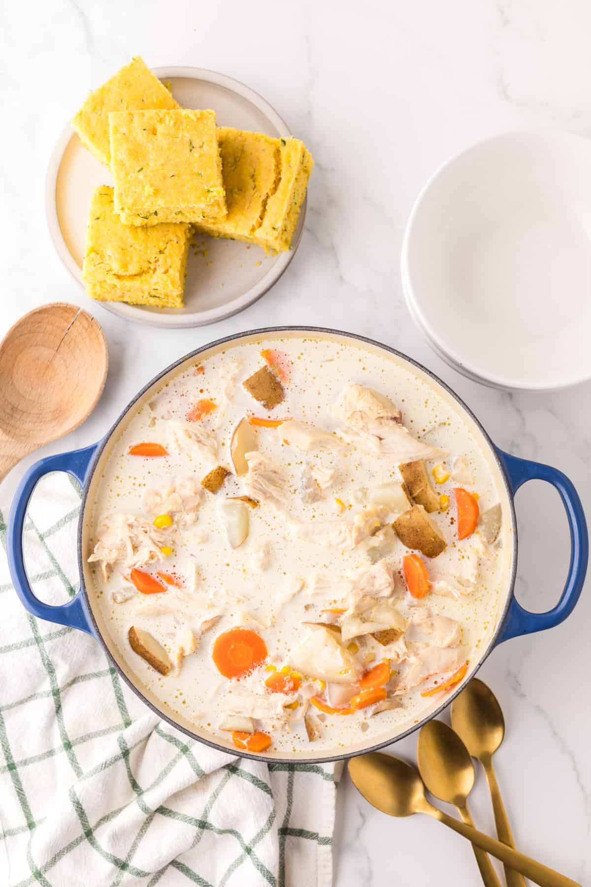 big dutch oven with baked potato corn chowder.