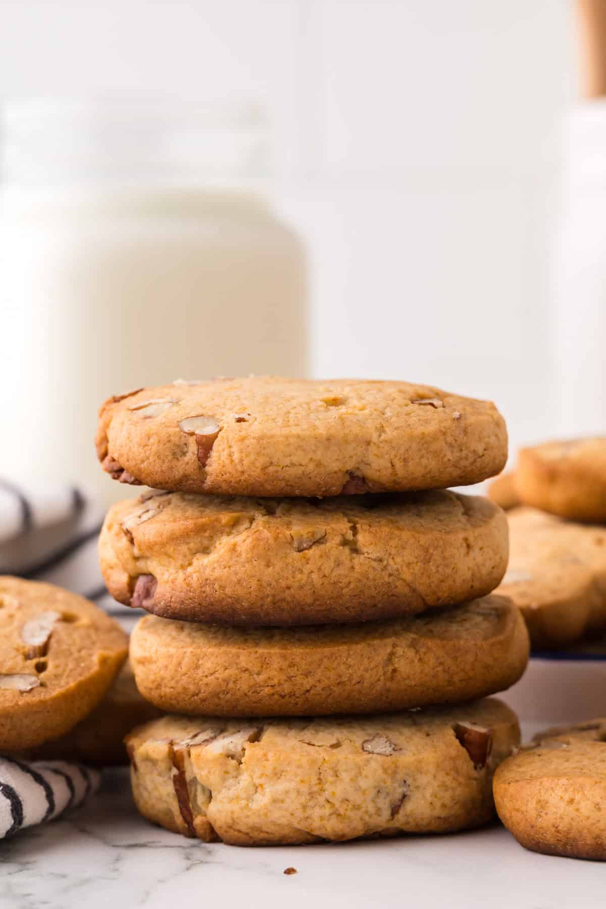 stack of four honey pecan sliced cookies on top of each other.