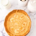 pie plate with the hoosier sugar cream pie baked inside.