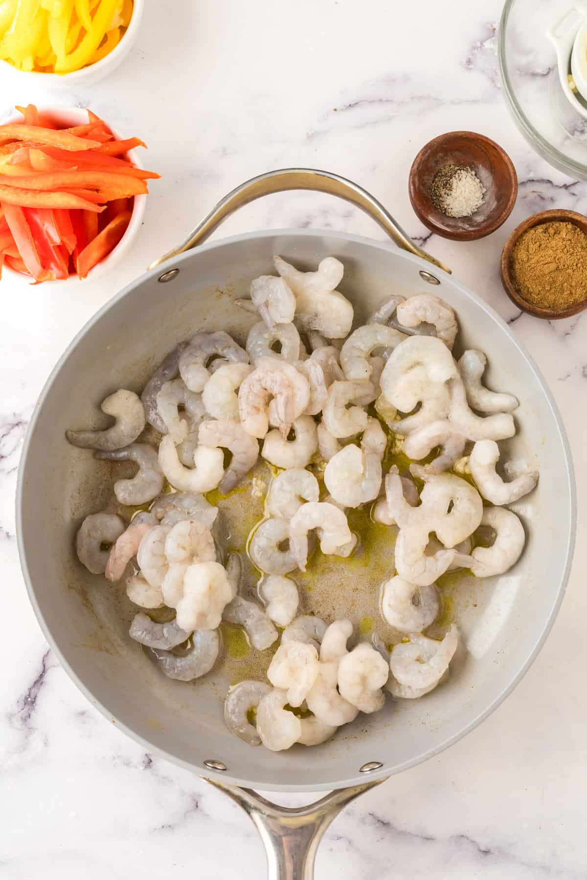 Shrimp Fajitas in a pan in the process of cooking.