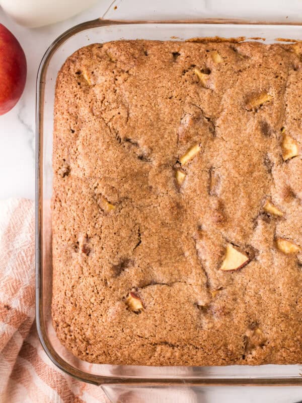 whole apple cake recipe in a glass pan.