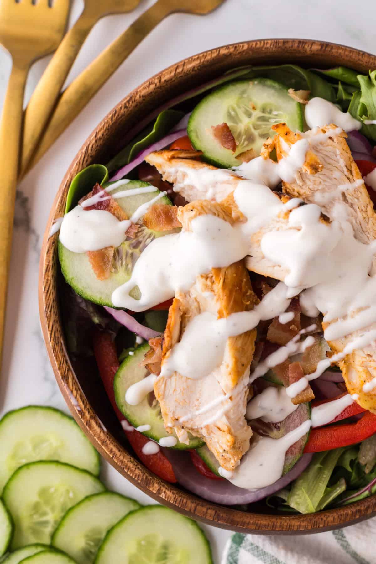 chicken bacon ranch salad recipe in a wooden bowl.