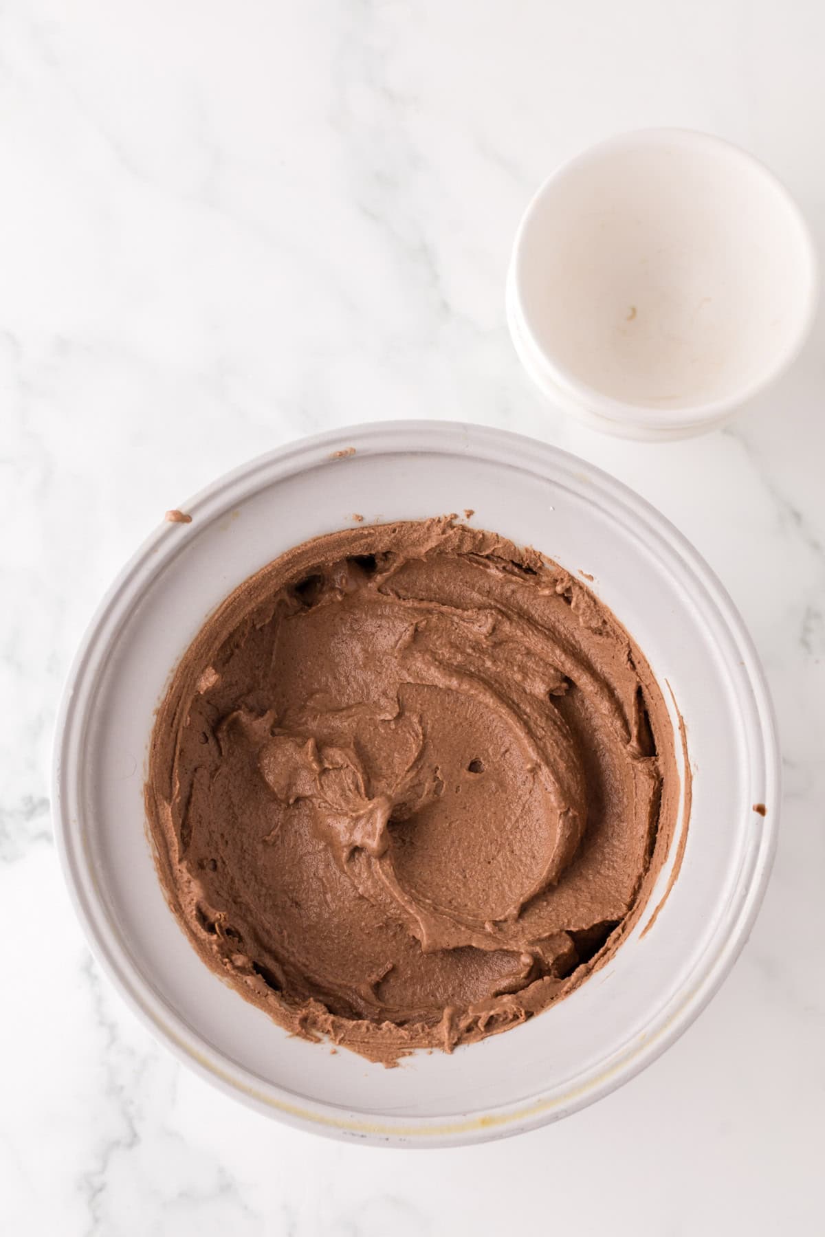 ice cream maker with chocolate peanut butter ice cream.