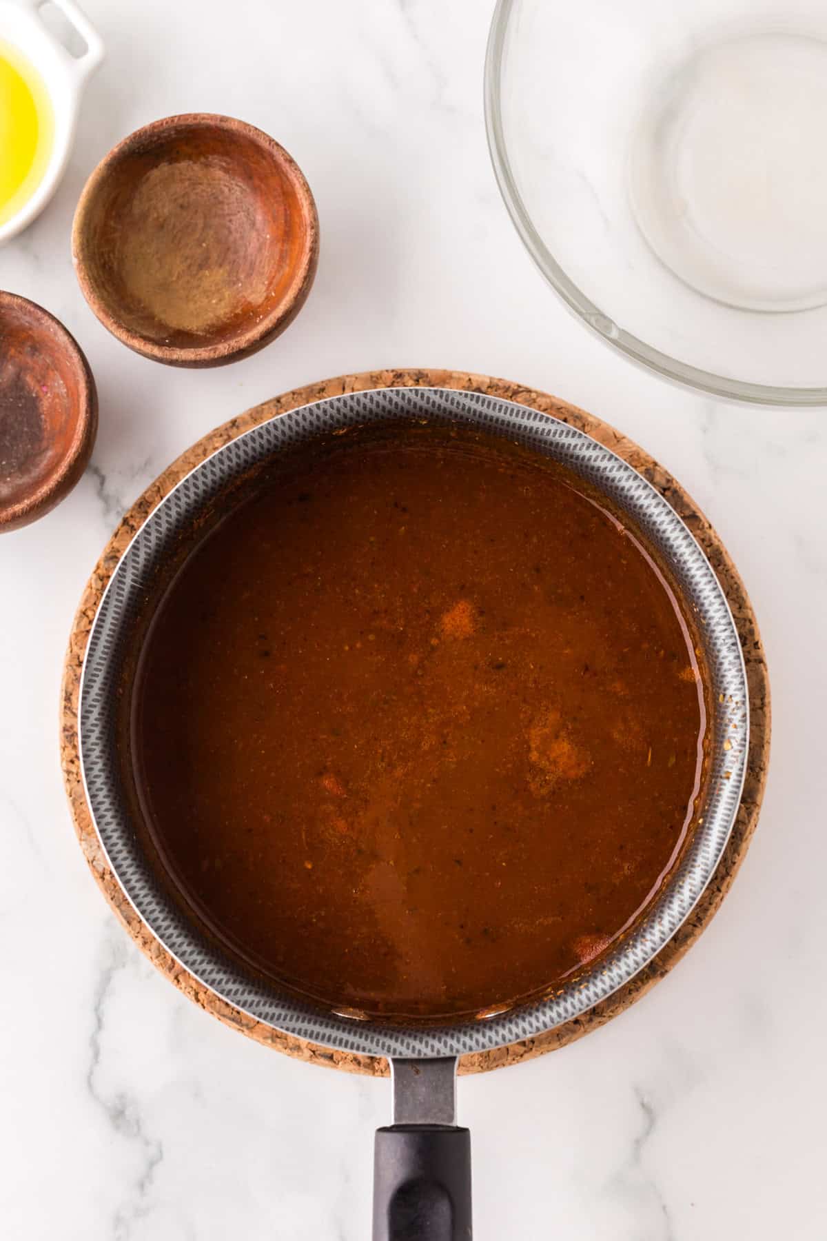 the process of making red enchilada sauce.