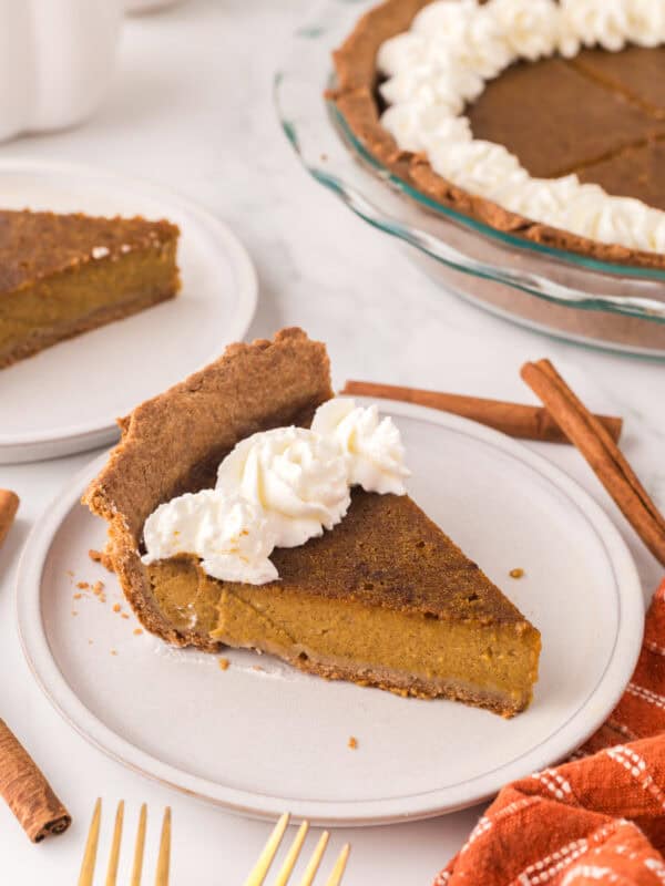 one slice of healthy pumpkin pie on a round plate.