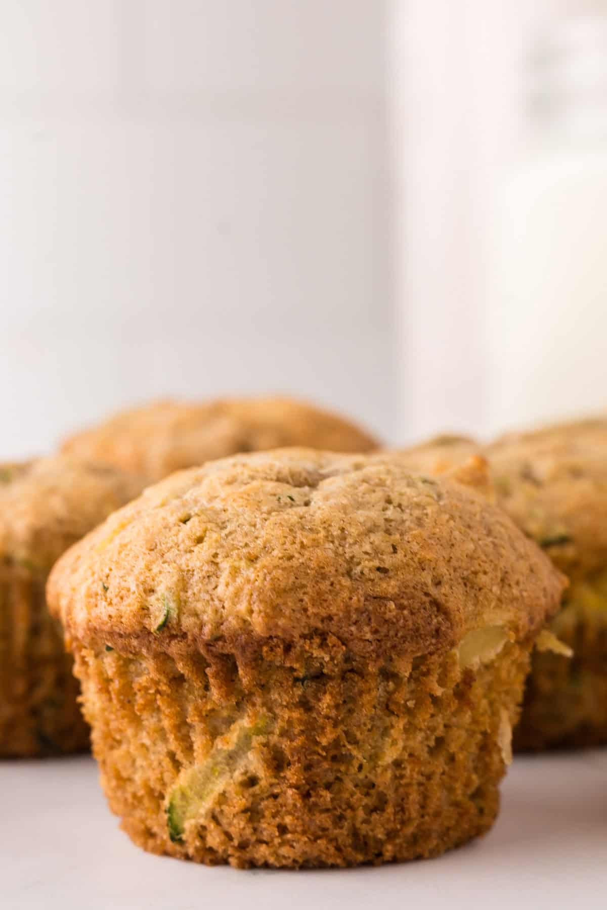 pineapple zucchini muffins on the counter.