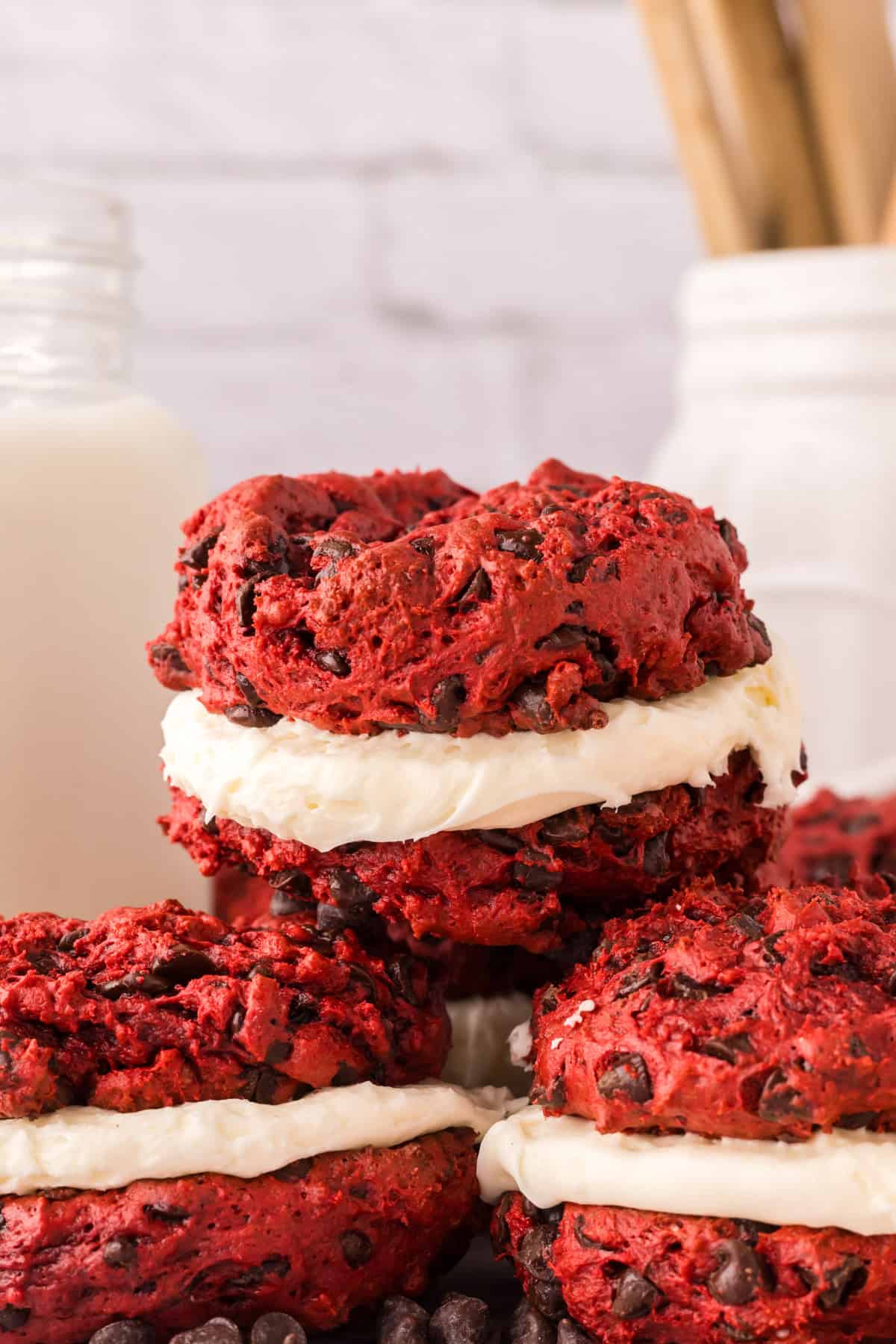 red velvet whoopee pies in a small pile on the counter.