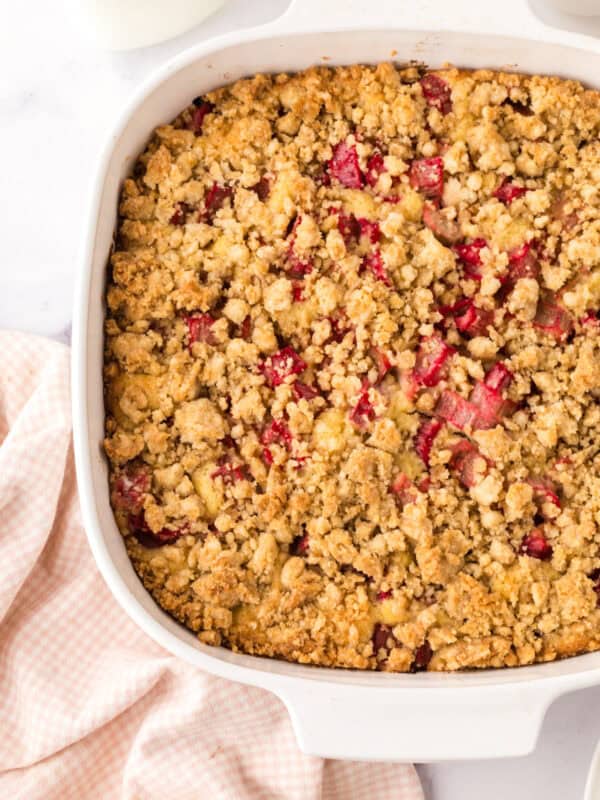 glass dish with baked rhubarb crumb bar recipe inside.