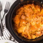 crock pot with slow cooker veggie lasagna recipe inside.