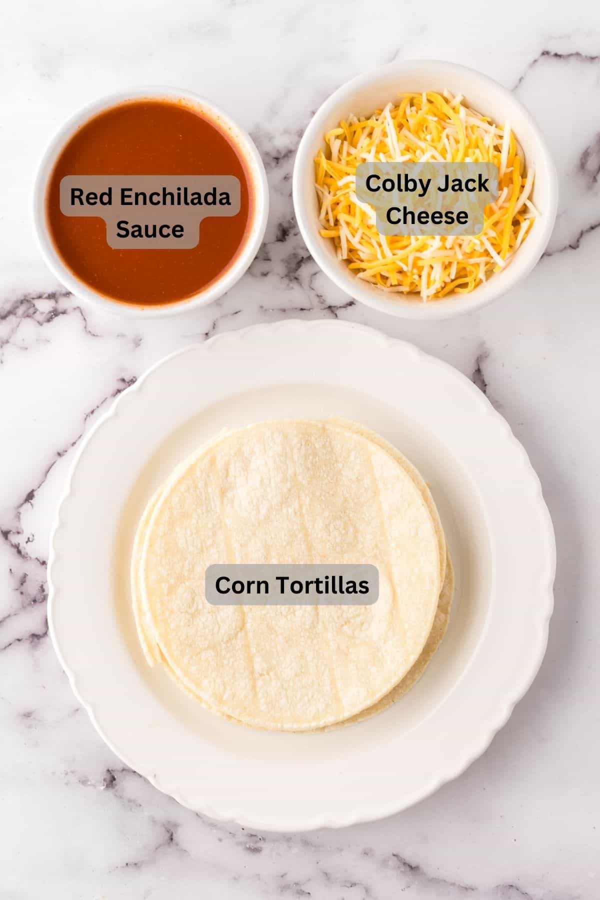 portion bowls each with digitally labeled raw ingredients to make red sauce cheese enchiladas.