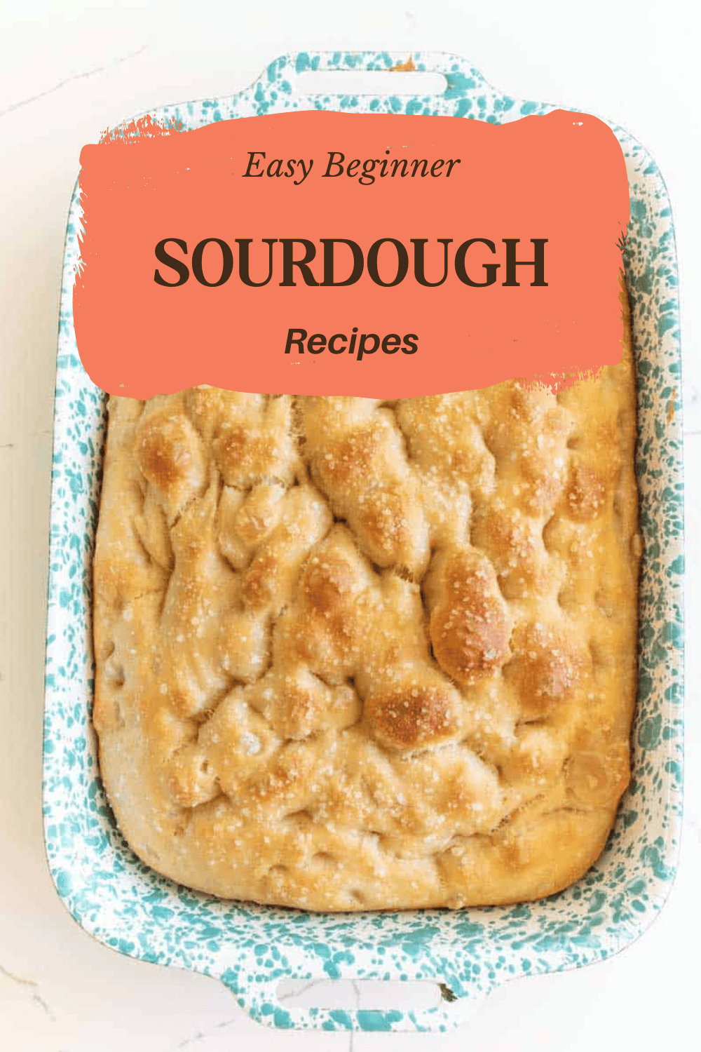 Knotted Sourdough bread in a teal and white ceramic pan with red and brow text saying "Easy Beginner Sourdough Recipes".