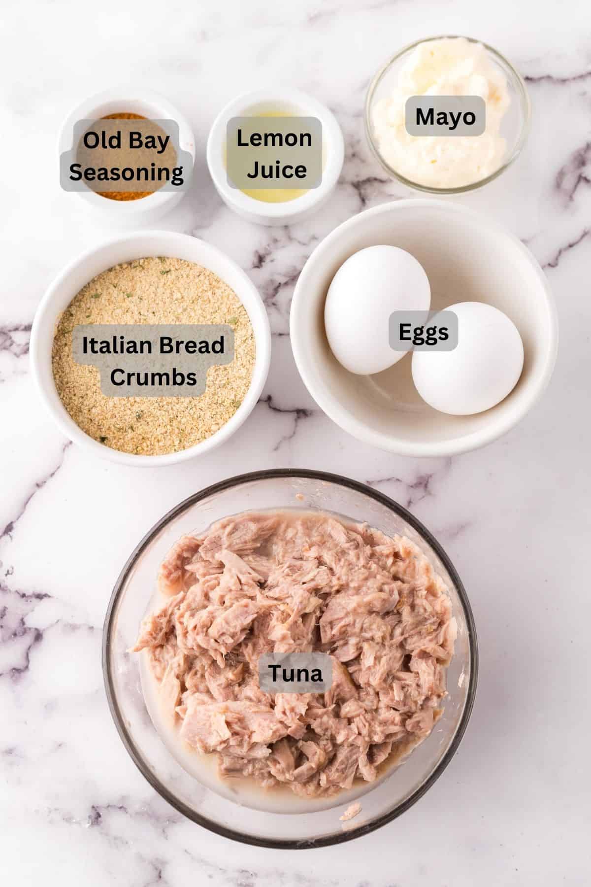 portion bowls each with digitally labeled raw ingredients to make tuna patties recipe.