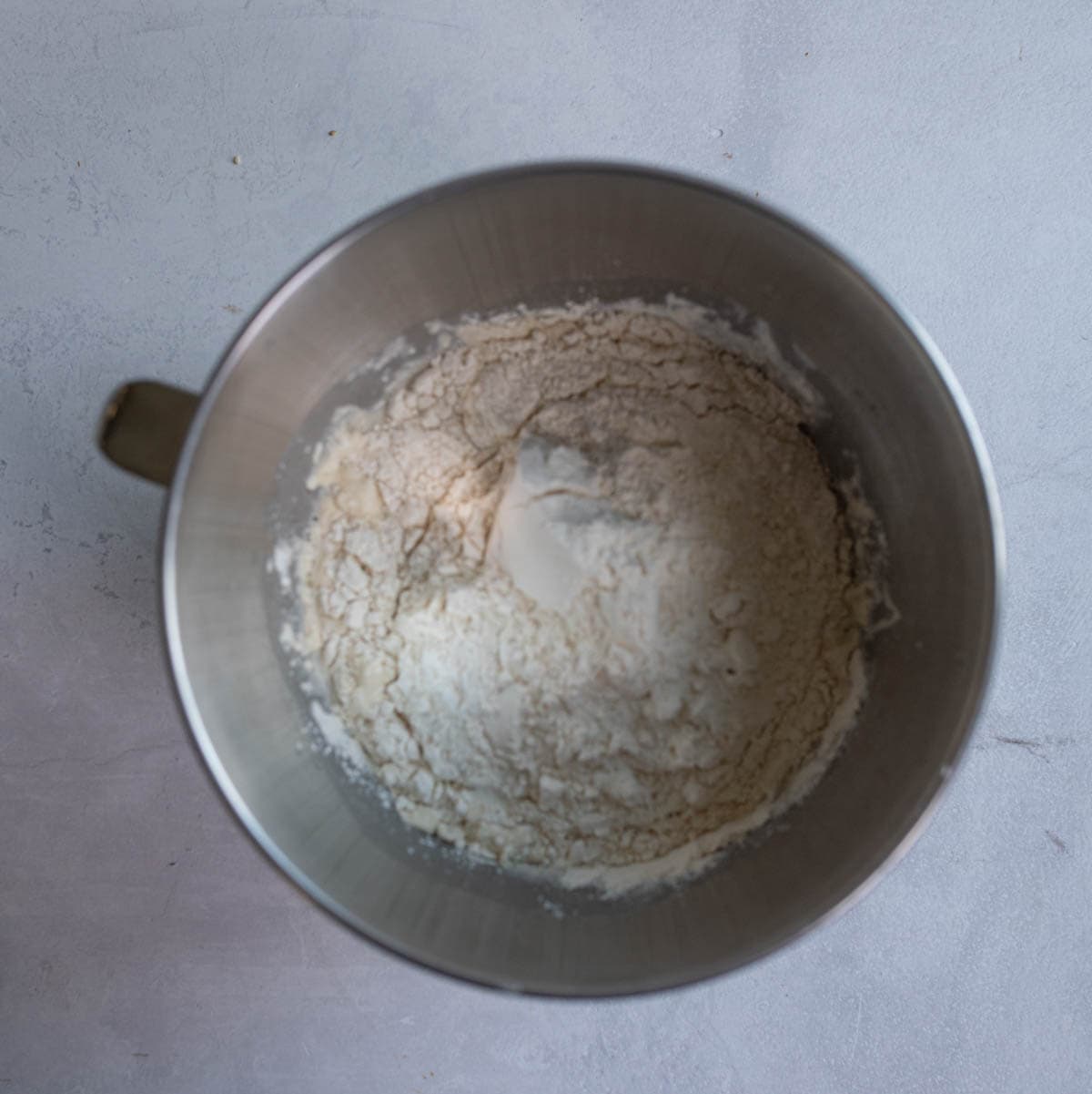 flour and bread ingredients in mixing bowl.