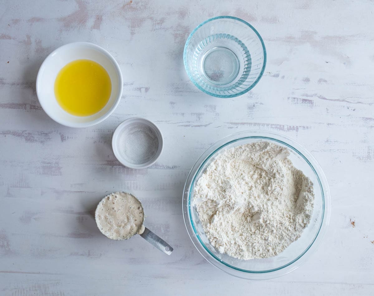 ingredients for tortillas on white countertop.