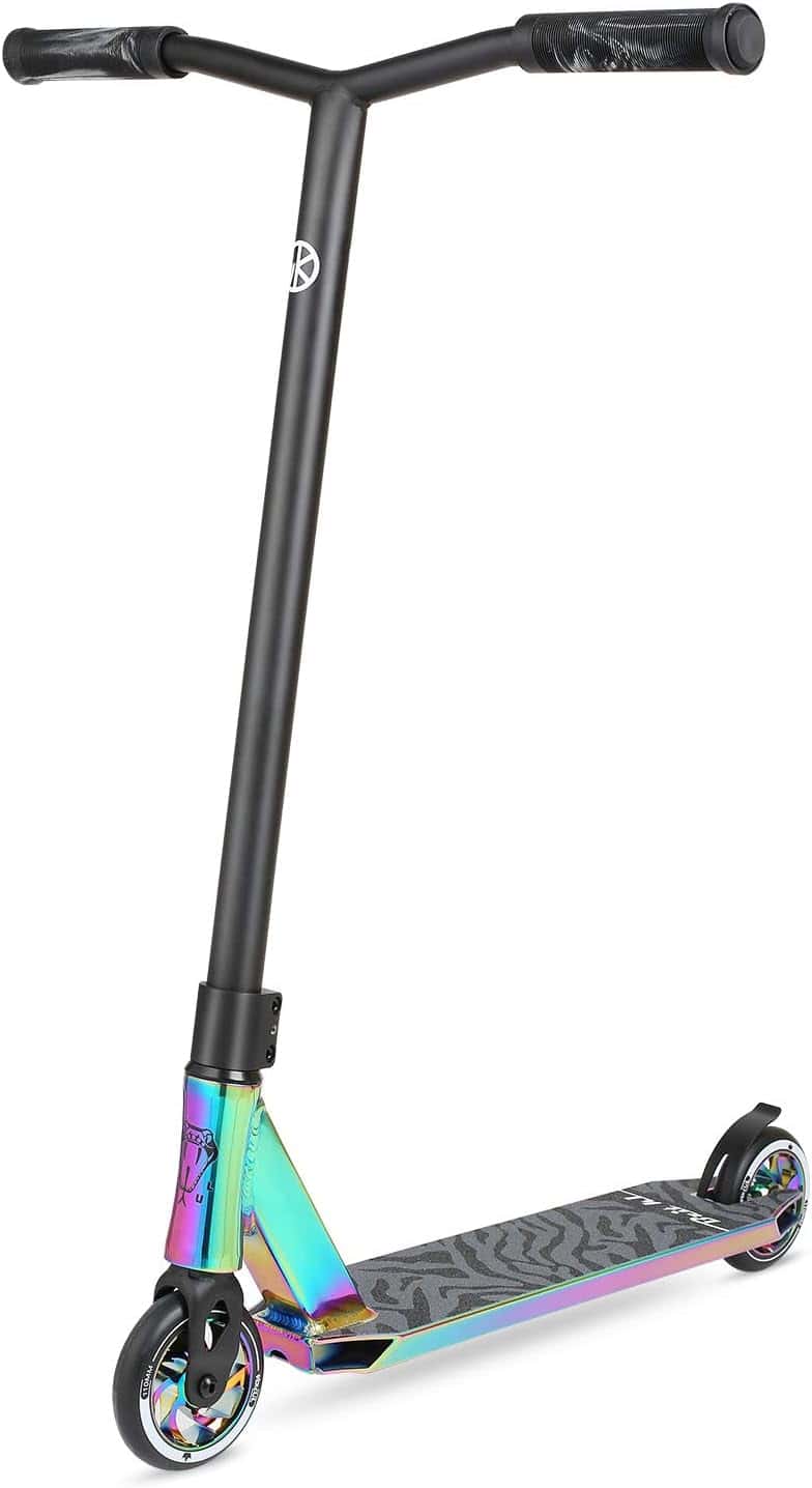 A vibrant, rainbow-colored stunt scooter with a black handlebar and wheels. The frame features an iridescent finish, and the deck has a textured surface for grip. The handlebars have black grips for secure handling.