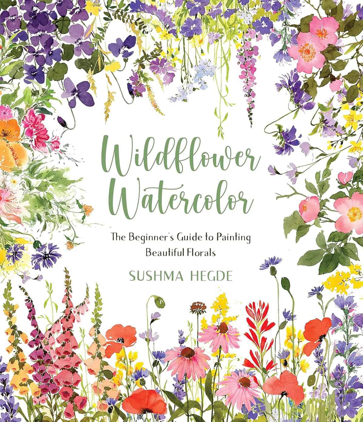 Colorful book cover for Wildflower Watercolor by Sushma Hegde, featuring various watercolor flowers like poppies, daisies, and lavender surrounding the title. The subtitle reads The Beginners Guide to Painting Beautiful Florals.