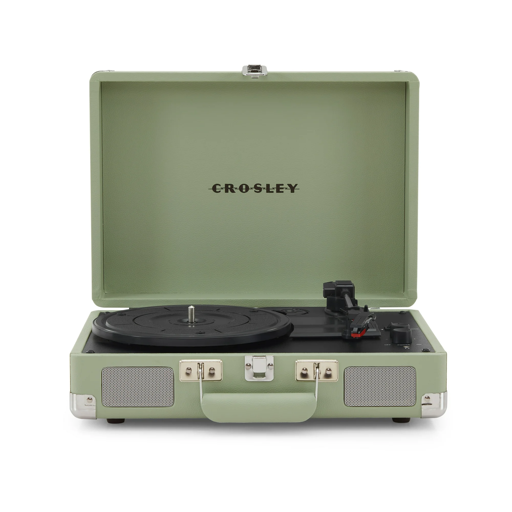 A green Crosley portable turntable with a closed lid, featuring built-in speakers and a handle. Designed for playing vinyl records, it has a classic suitcase shape with a modern touch.