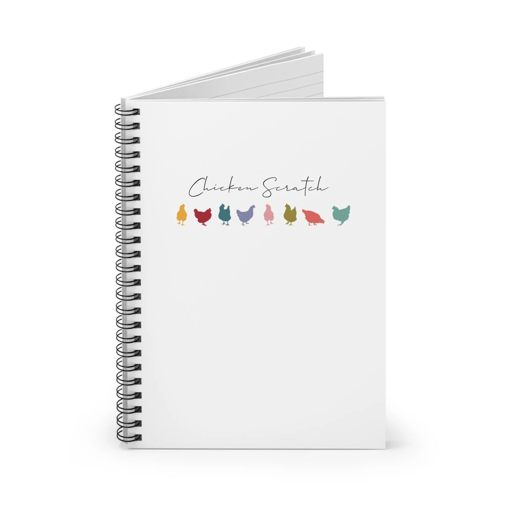 A spiral-bound notebook with the title Chicken Scratch on the cover. Below the title, there are seven small, colorful silhouettes of chickens in a row. The background is plain white.