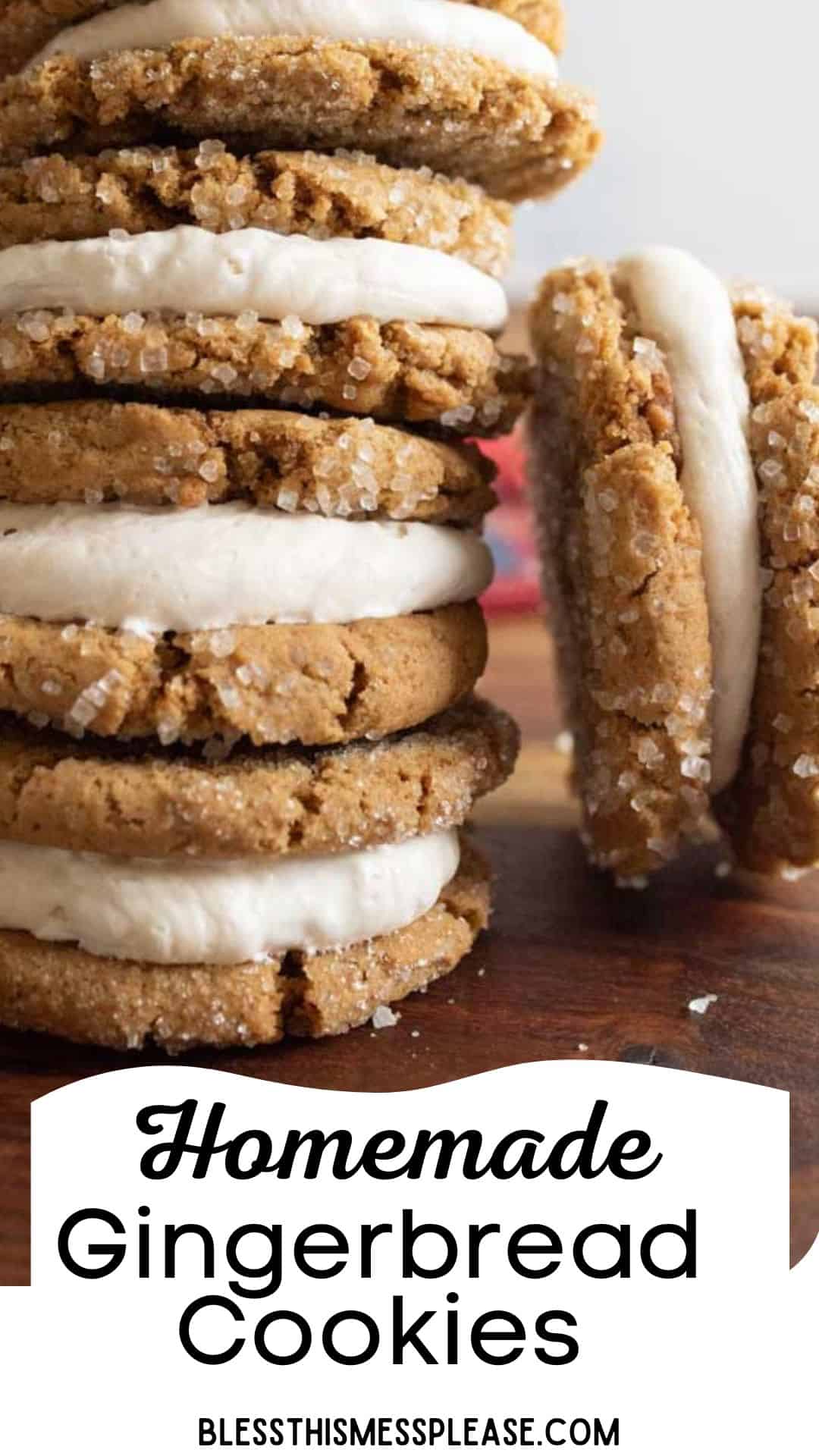 A stack of homemade gingerbread cookies filled with creamy white icing. The cookies are sprinkled with sugar crystals. A partially visible cookie is in the background. The text reads Homemade Gingerbread Cookies with a website link below.